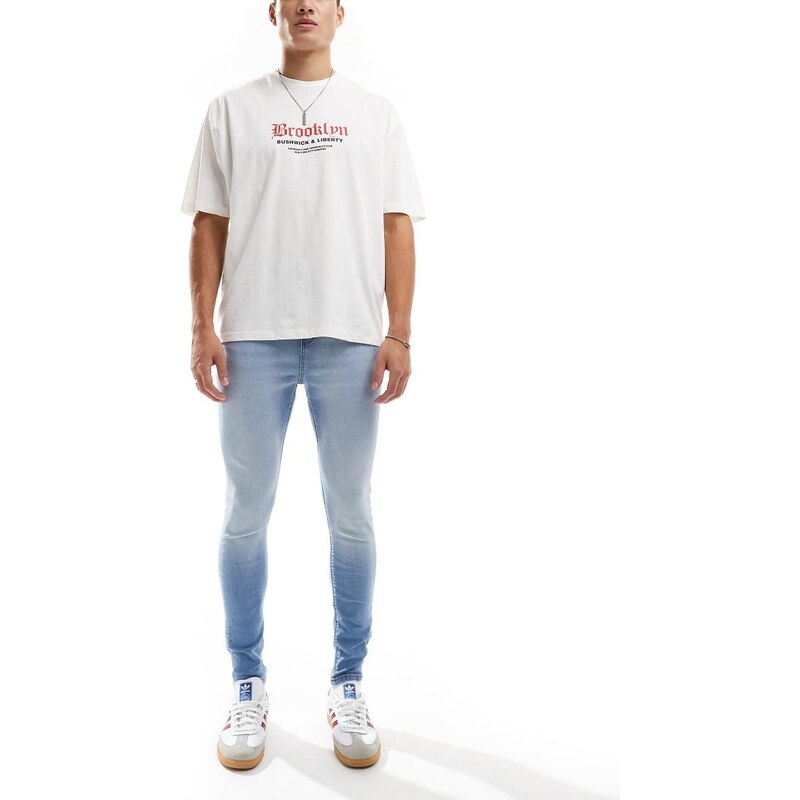 ASOS DESIGN power stretch jeans in light wash-Blue