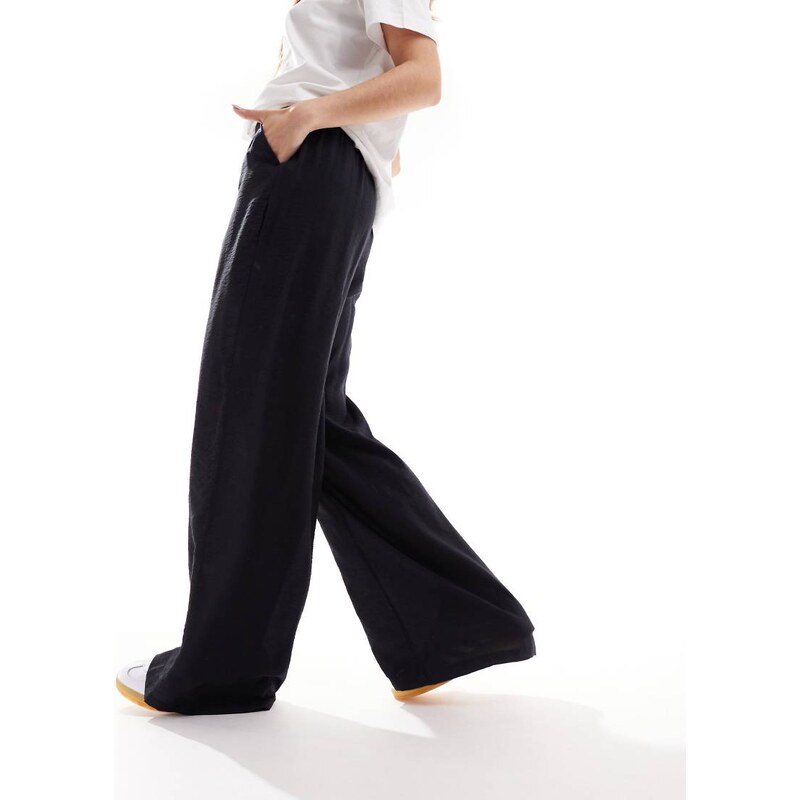 Vero Moda high waisted wide leg trousers in black 114979094