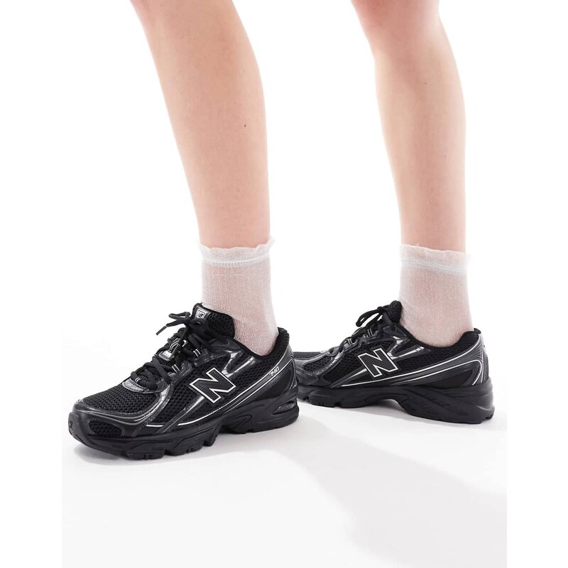 New Balance 740 trainers in black and silver metallic 103494399