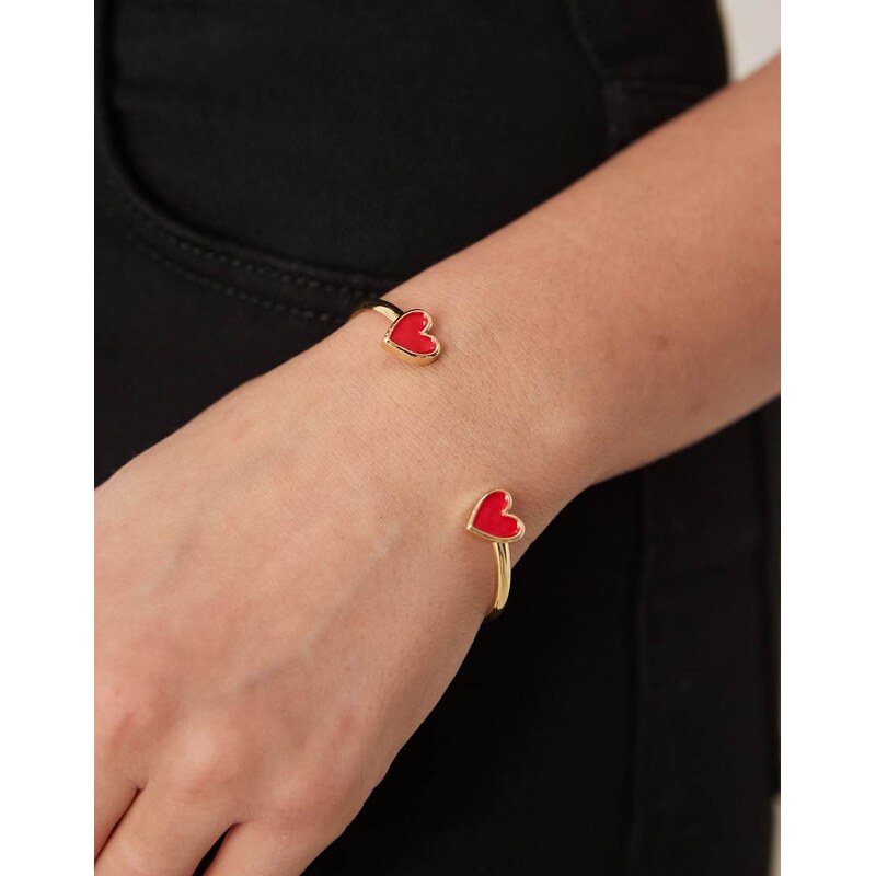 ASOS DESIGN cuff bracelet with enamel heart detail in gold tone 104493729