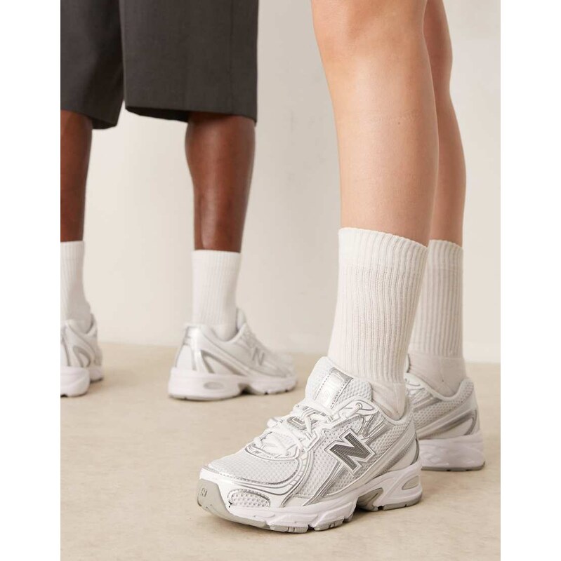 New Balance 740 trainers in white and silver