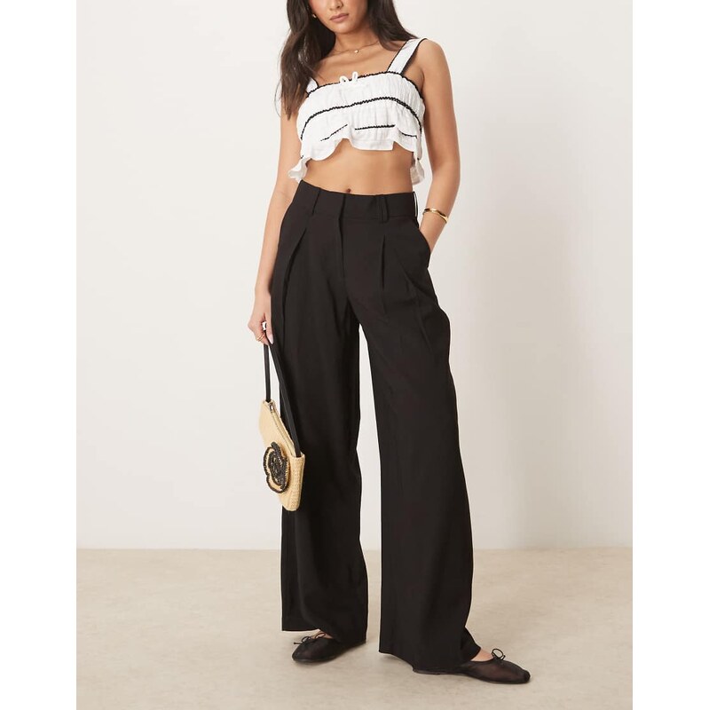 AWARE high waisted pleat front trousers in black