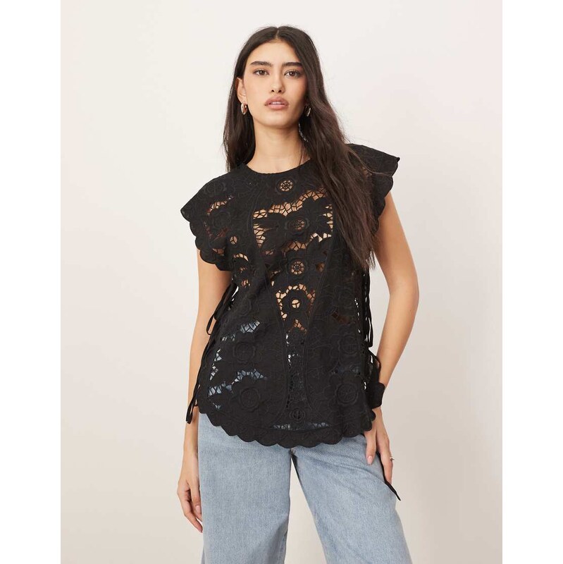 ARRANGE cotton cutwork embroidered top with tie side in black 113260416