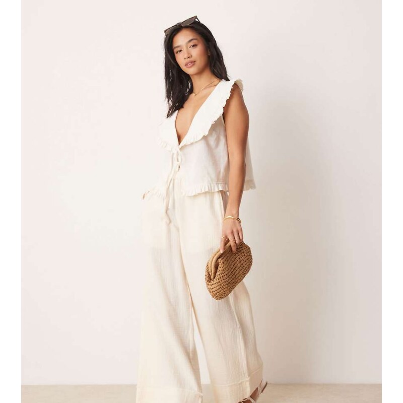 ASOS Petite ASOS DESIGN Petite cheesecloth pull on trousers with raw 115510598