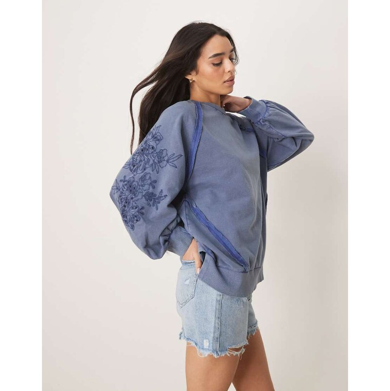 ASOS DESIGN oversized sweat with seam detail and cutwork sleeves in 115730542