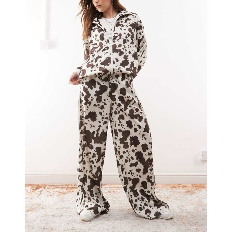 adidas Originals satin wide leg track pants in cow print-Multi