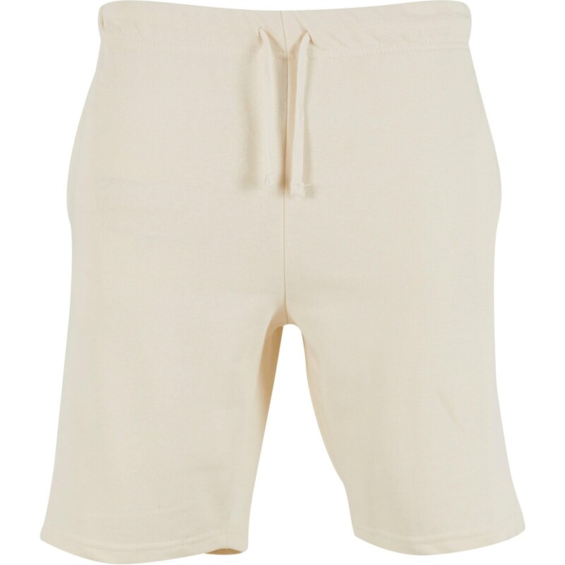 Urban Classics Kalhoty Terry pastelově oranžová