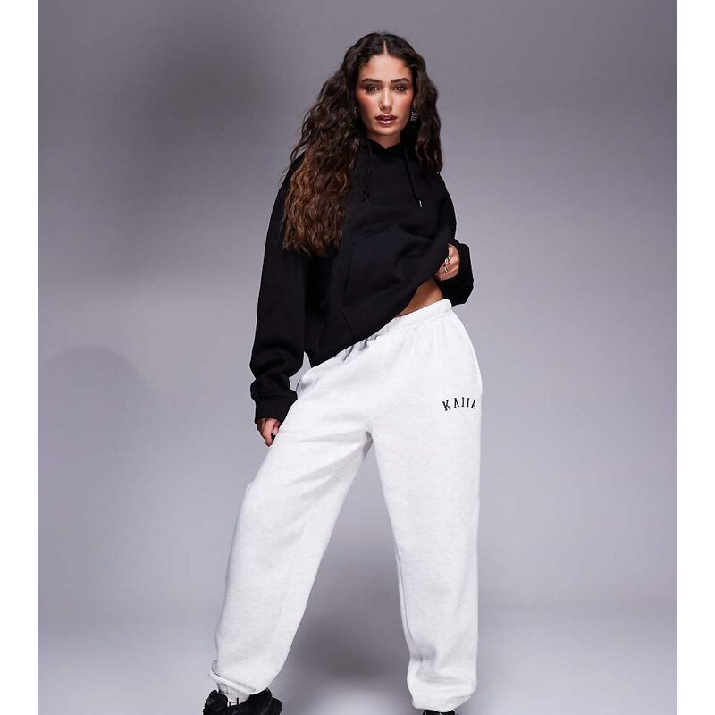 Kaiia Petite cotton blend embroidered logo cuffed joggers in