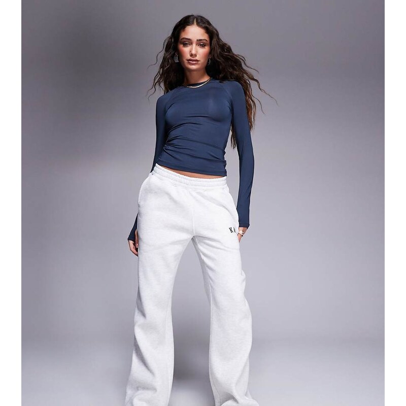 Kaiia Petite cotton blend embroidered logo wide leg joggers in
