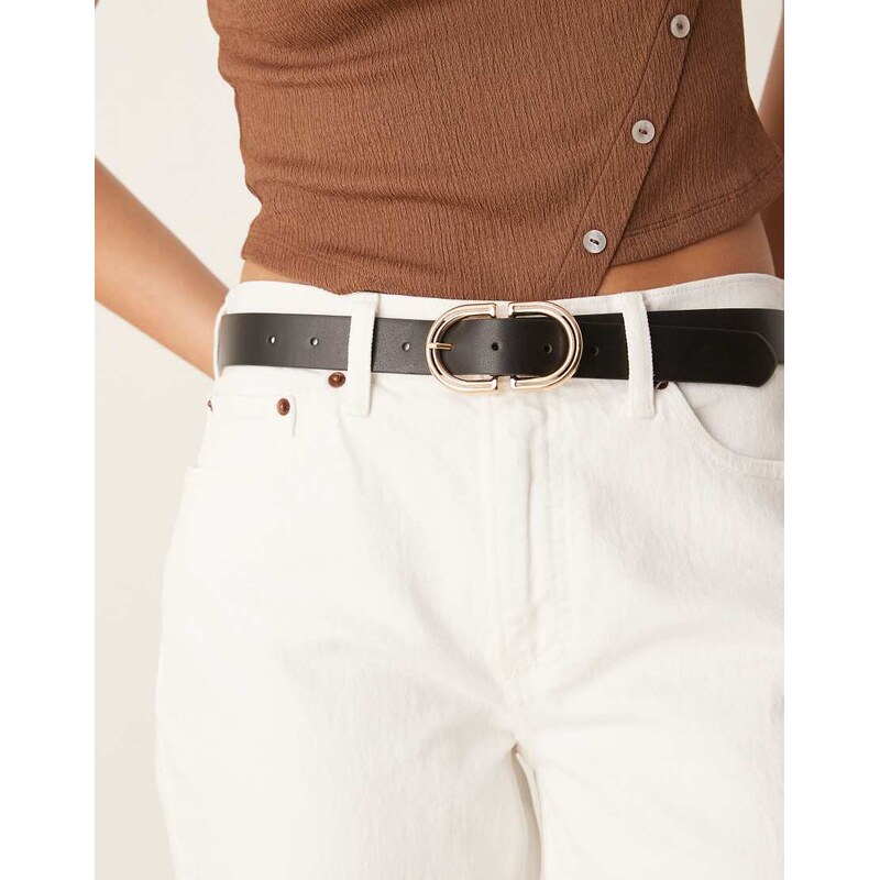 ASOS DESIGN waist and hip jeans belt with gold hardware in black 105113605