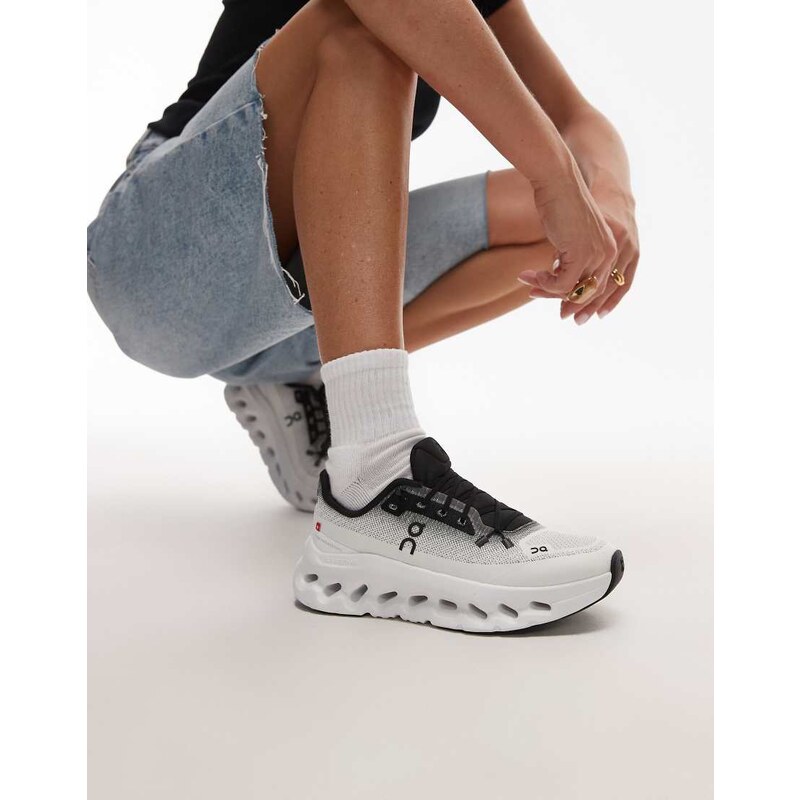ON Cloudtilt all day trainers in white and black