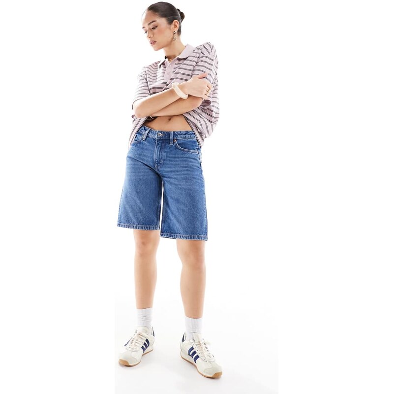 Monki Imoo low waist denim jorts in mid blue wash