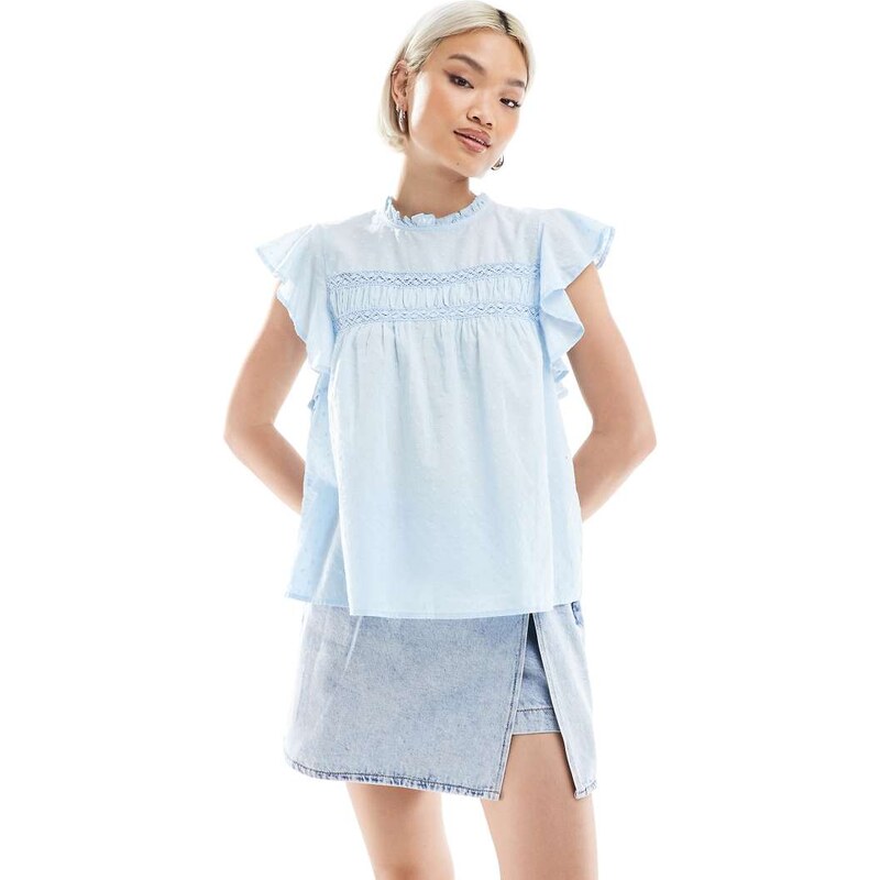 Vero Moda high neck flutter sleeved embroidered top in blue 115511199