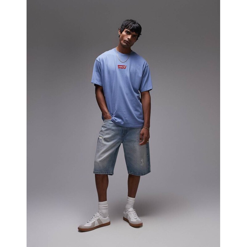 Levi's 469 loose fit distressed denim shorts in light wash-Blue