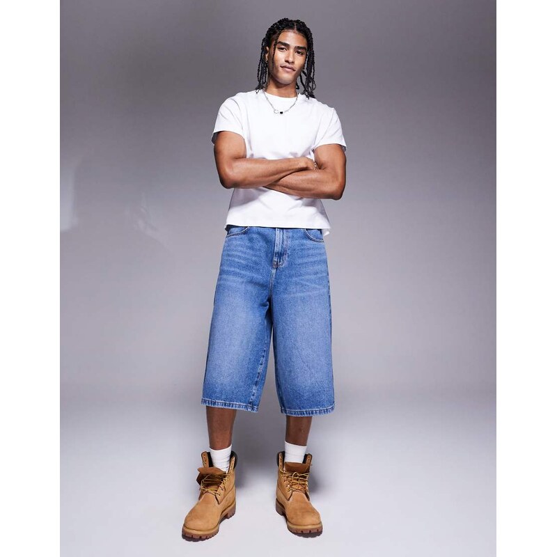 ASOS DESIGN longer length denim jort in mid wash blue