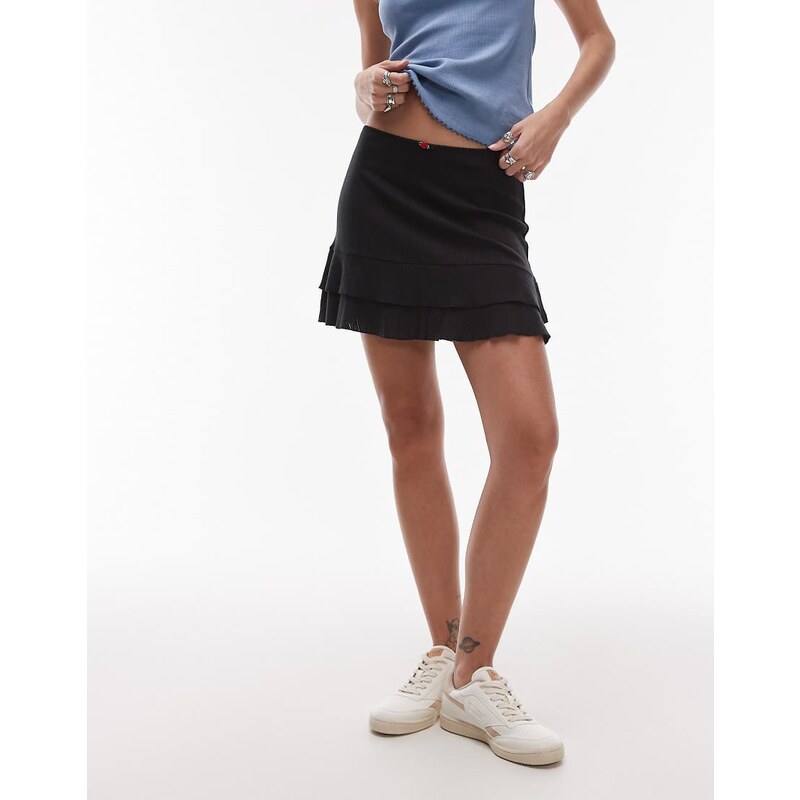 Tommy Jeans pointelle ruffle mini skirt in black 106101704