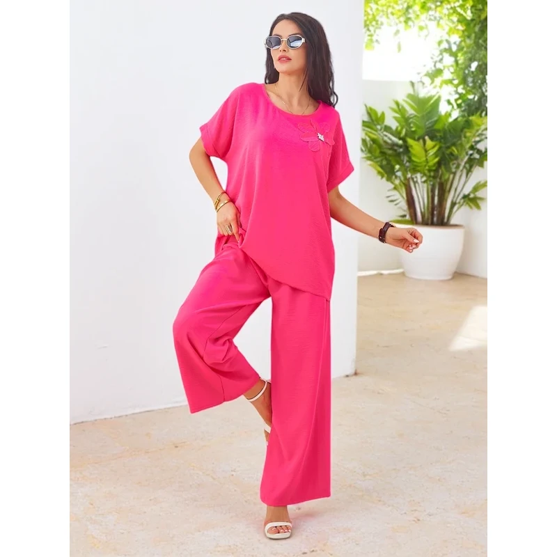 Resti Womens set with short sleeves, decorative flower, and wide