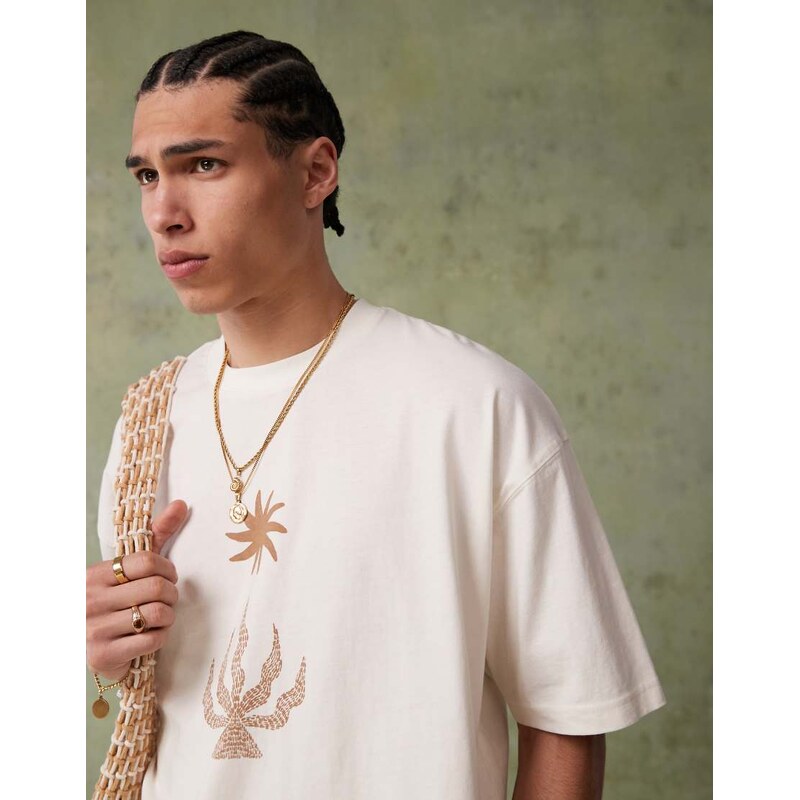 ASOS DESIGN oversized t-shirt with celestial graphic in cream