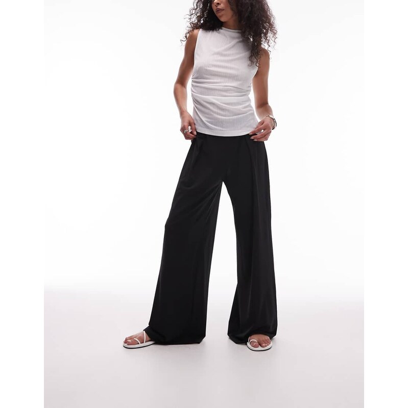 Mango elasticated waist wide leg stretch trousers in black 105671994