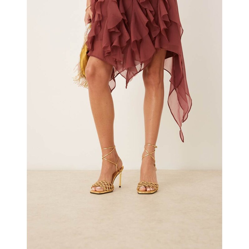 ASOS DESIGN Nadine knotted high heeled sandals in gold 109823366