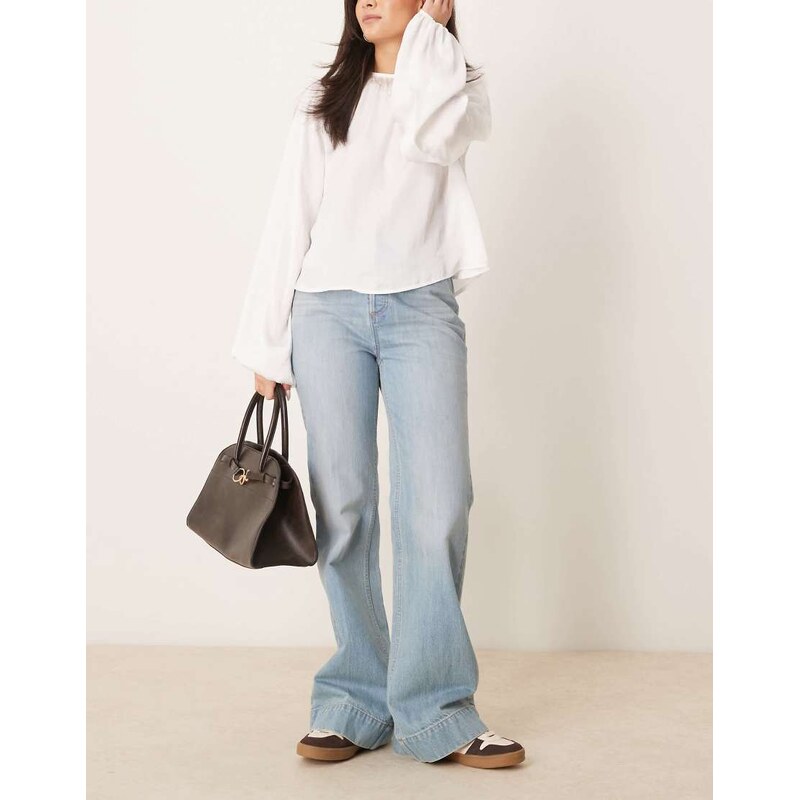 Free People cerine relaxed bootcut jeans in light blue 105762624