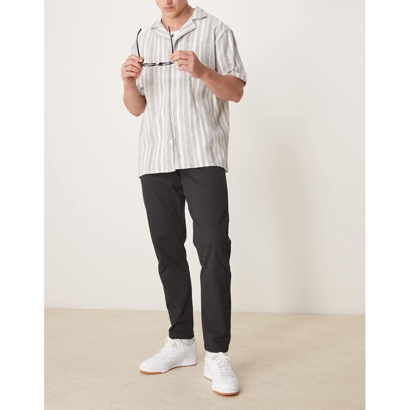 ASOS DESIGN tapered chinos in black