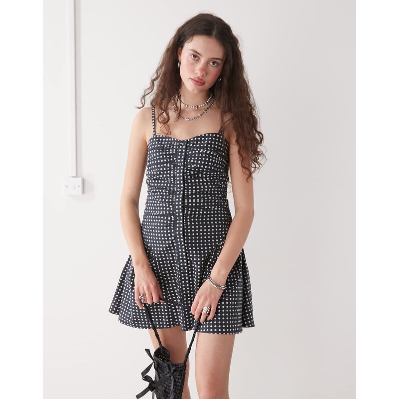 Reclaimed Vintage dropped waist mini sun dress in navy and white