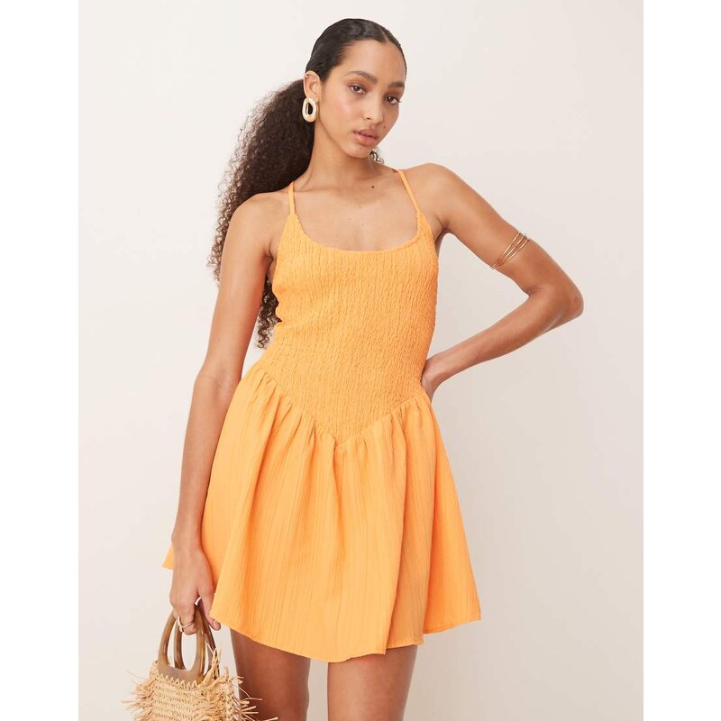 ASOS DESIGN scoop neck crinkle mini sundress with cross back in