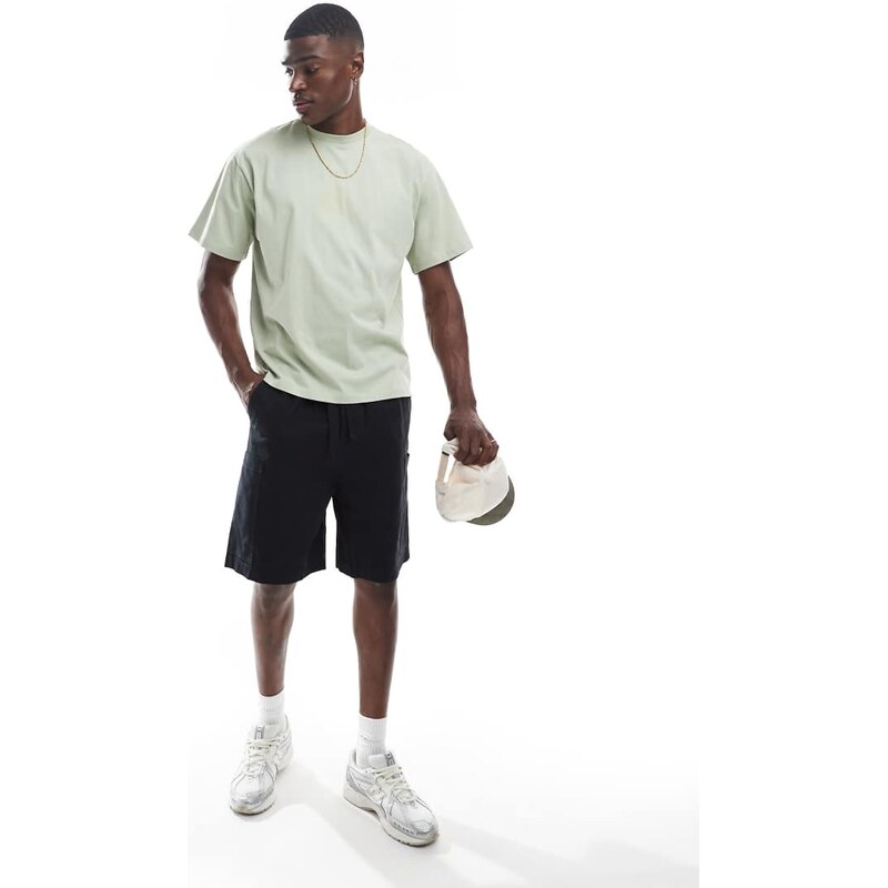 ASOS DESIGN mid length cargo shorts with patch detail in black