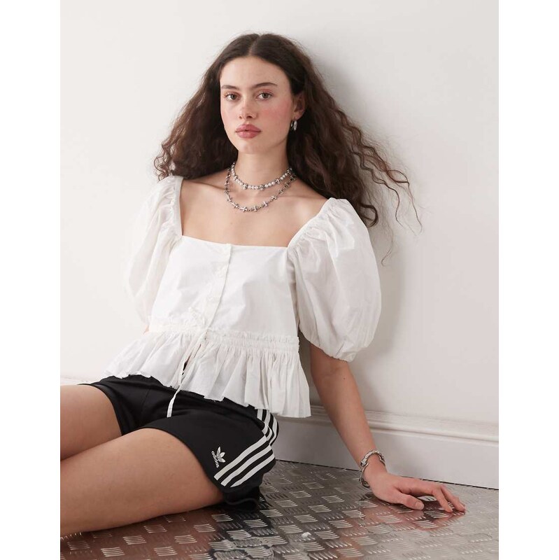 Monki puff sleeve milkmaid peplum blouse in white 105997096