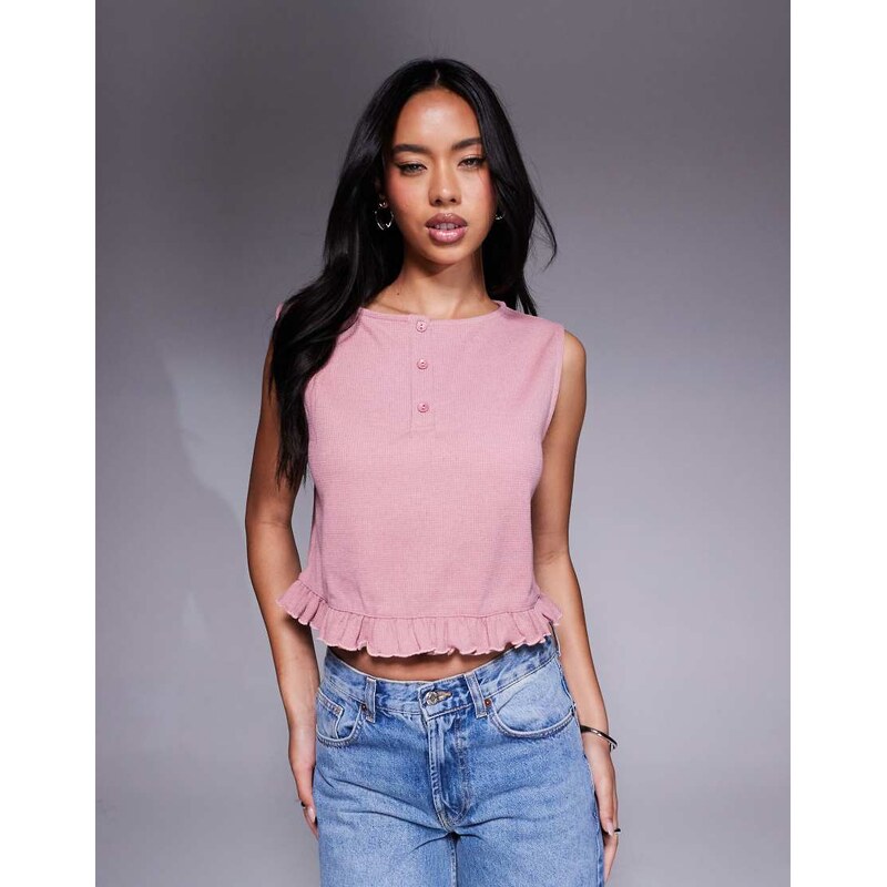 ASOS DESIGN sleeveless waffle top with frill hem in pink 105882687