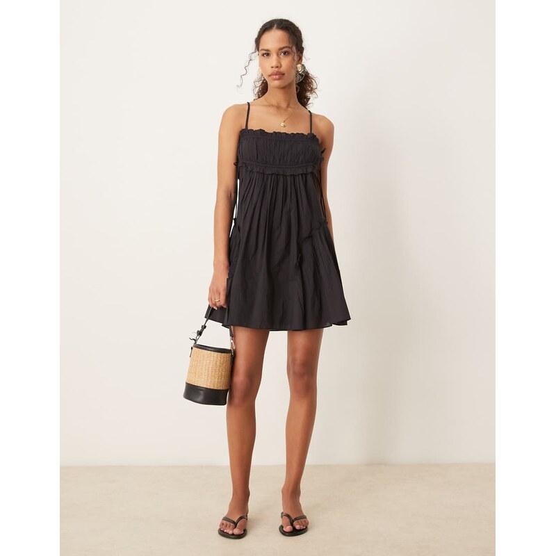 ASOS DESIGN babydoll mini sundress with ruffle hem in black