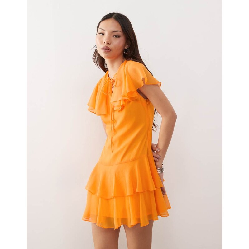 Reclaimed Vintage mini dress with cape detail and tiers in orange 106512743