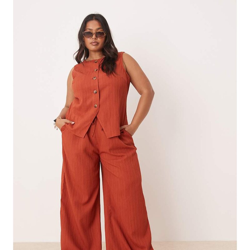 ASOS Curve ASOS DESIGN Curve crinkle palazzo trousers co-ord in rust 106063507