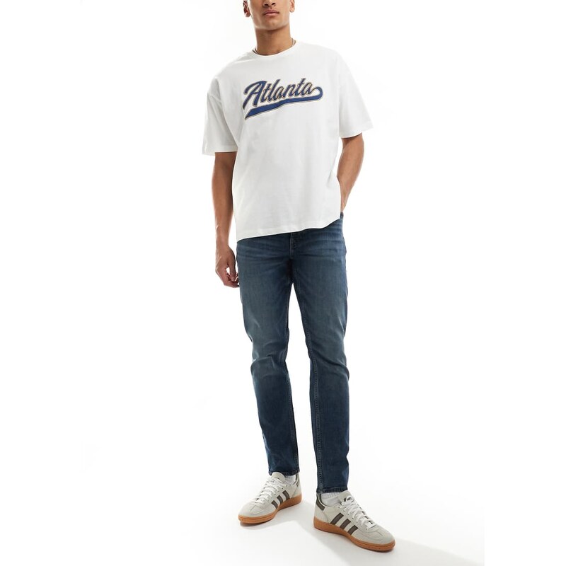 ASOS DESIGN slim fit jeans in with vintage tint in dark wash