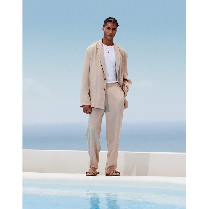 ASOS DESIGN oversized tapered lightweight suit trousers in stone-Neutral