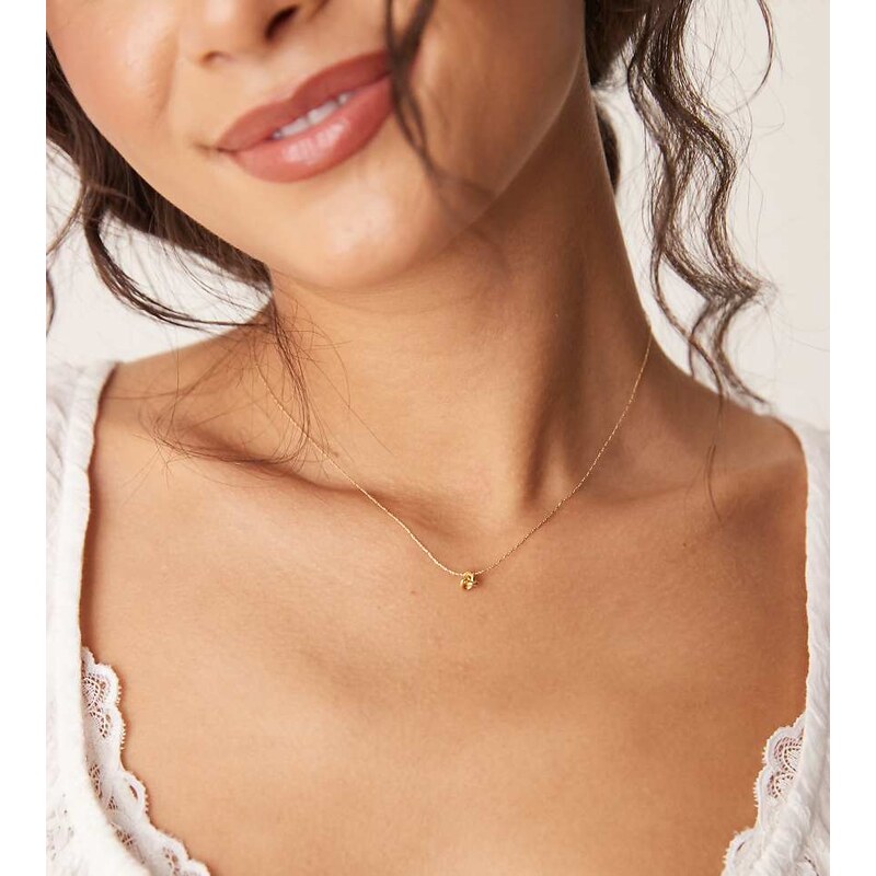 Orelia mini knot fine chain necklace in 18k gold plated