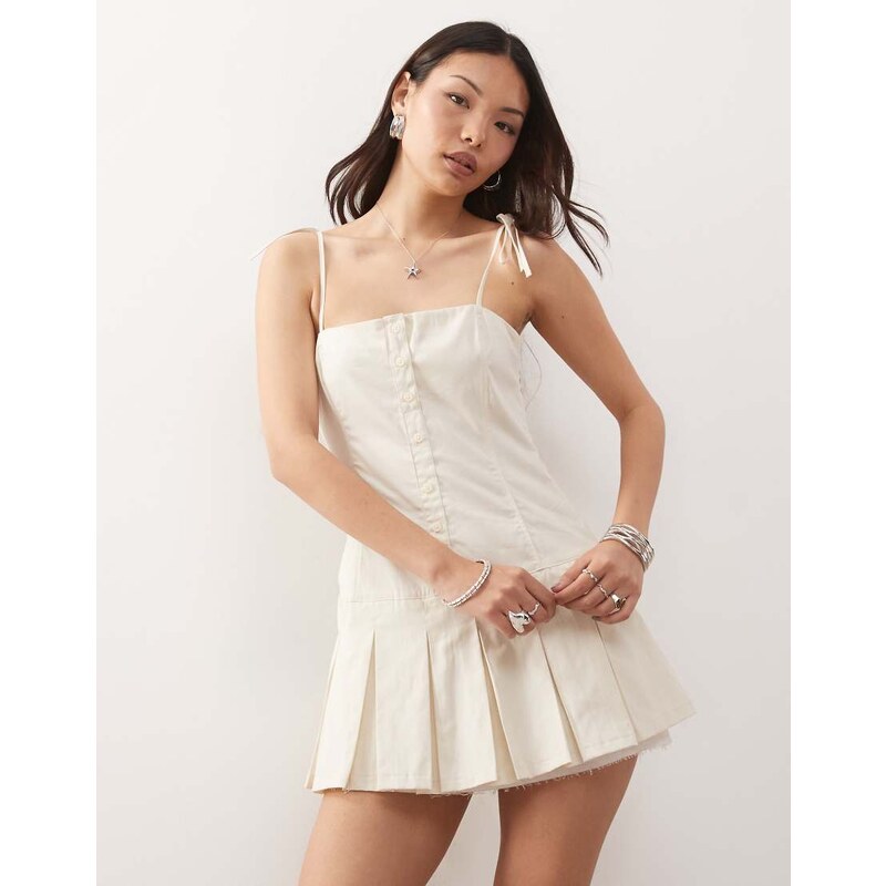 Monki cotton drop waist mini dress with pleated skirt in white