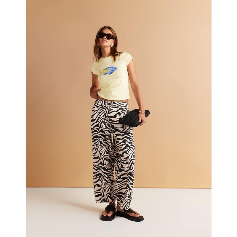 ASOS DESIGN laundered barrel leg trousers in zebra print-Multi