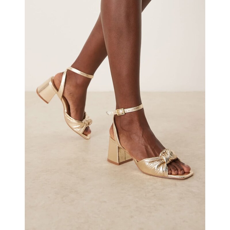 ASOS DESIGN Hansel knotted mid heeled sandals in gold 106410090