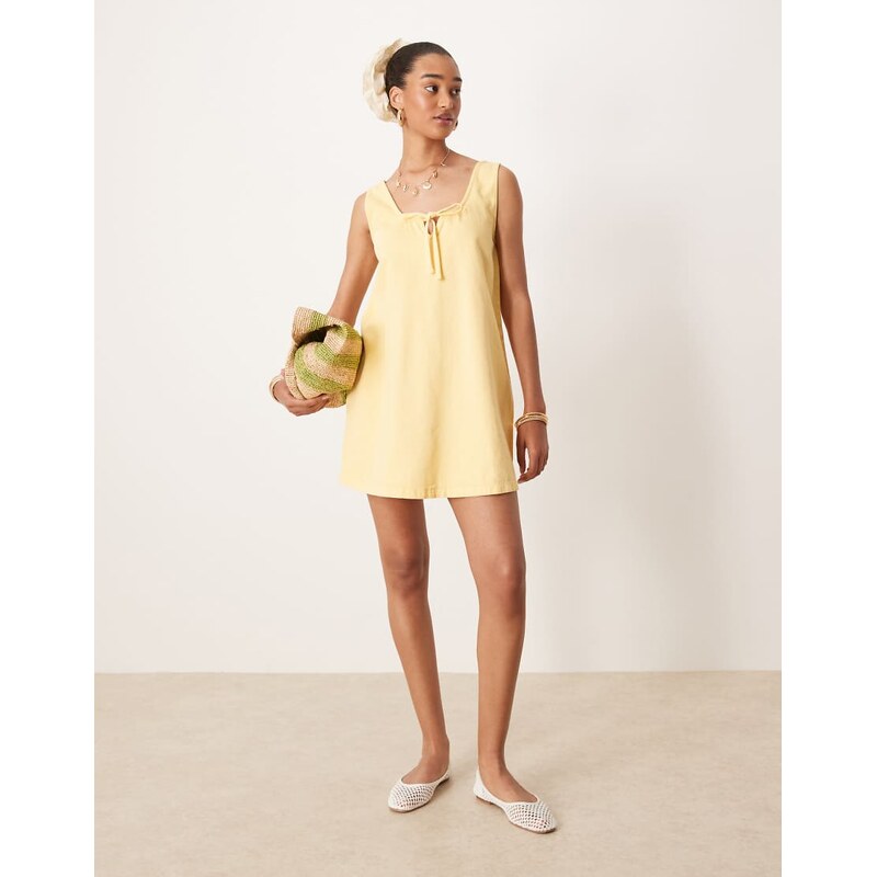 ASOS DESIGN denim scoop mini dress with bow front in buttermilk