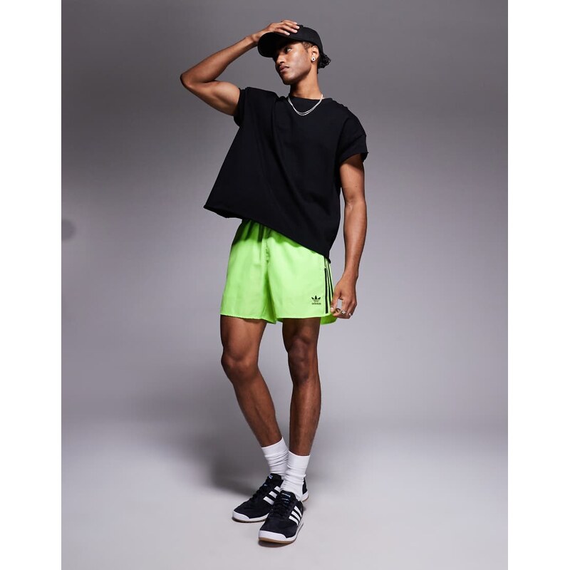 adidas Originals Adicolor sprinter shorts in lime-Green 106452492
