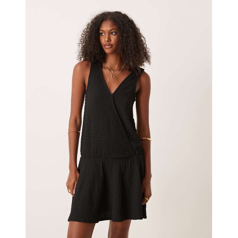 ASOS DESIGN textured sleeveless V front wrap with drop waist
