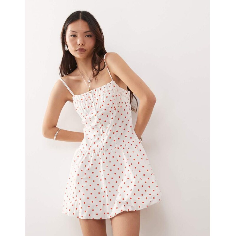 Reclaimed Vintage puffball mini dress with hook and eye in red polka 107712468