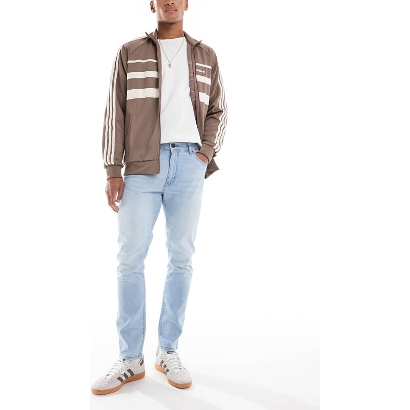 Wrangler Larston slim tapered fit jeans in light wash blue