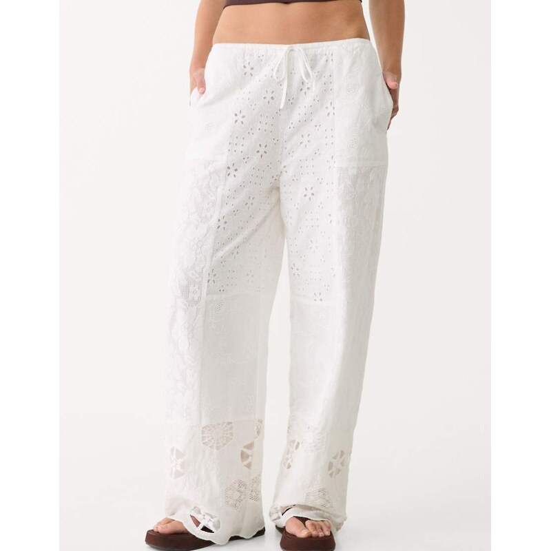 Stradivarius embroidered patchwork trousers in white