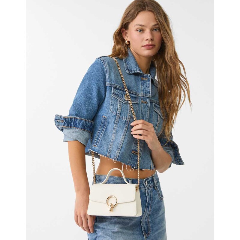 Stradivarius crossbody bag with round clasp in white 106692816
