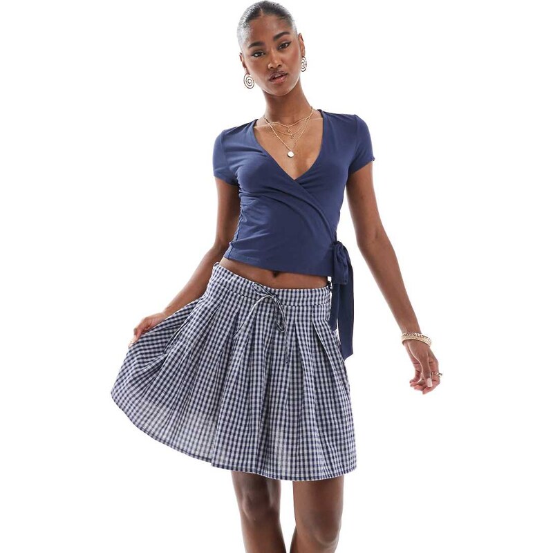ONLY pleated mini skirt with tie waist in navy gingham