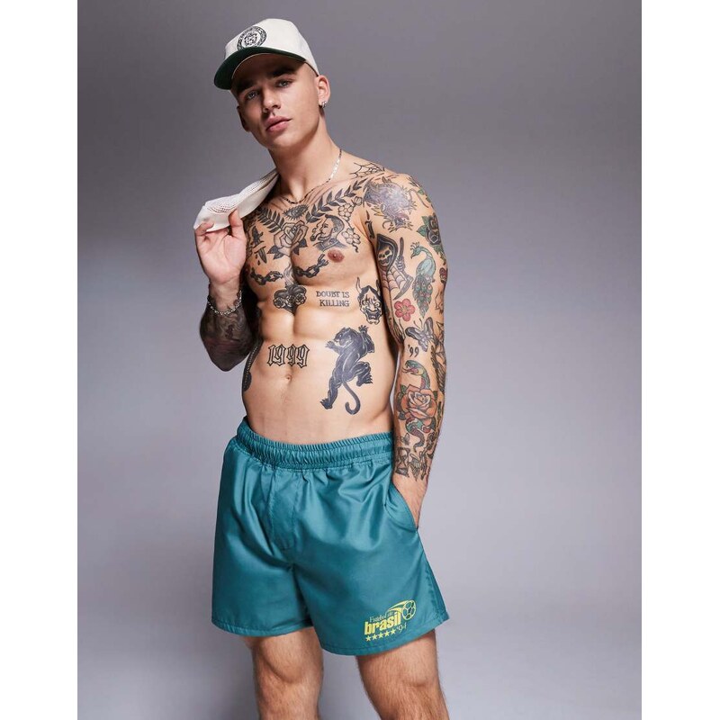 ASOS DESIGN swim shorts in short length with placement print in