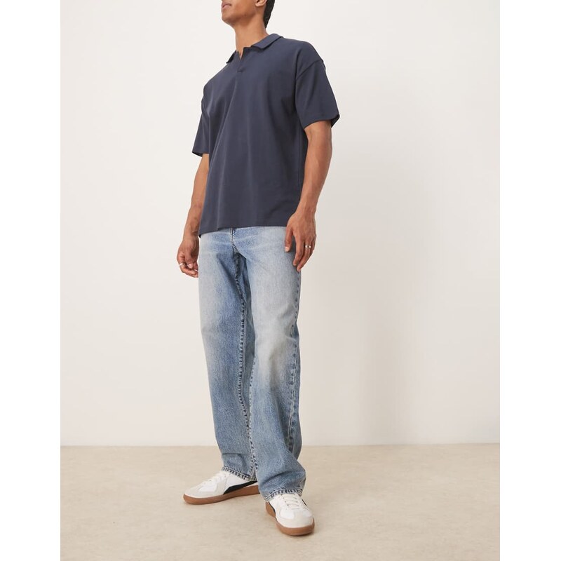 ASOS DESIGN baggy fit jeans in mid wash blue